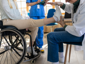 A patient engaging in post-stroke rehabilitation to improve their motor functions